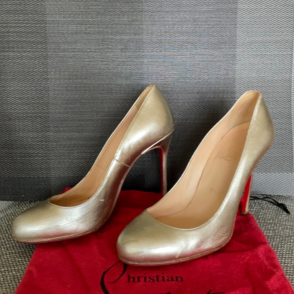 Christian Louboutin Gold Pumps